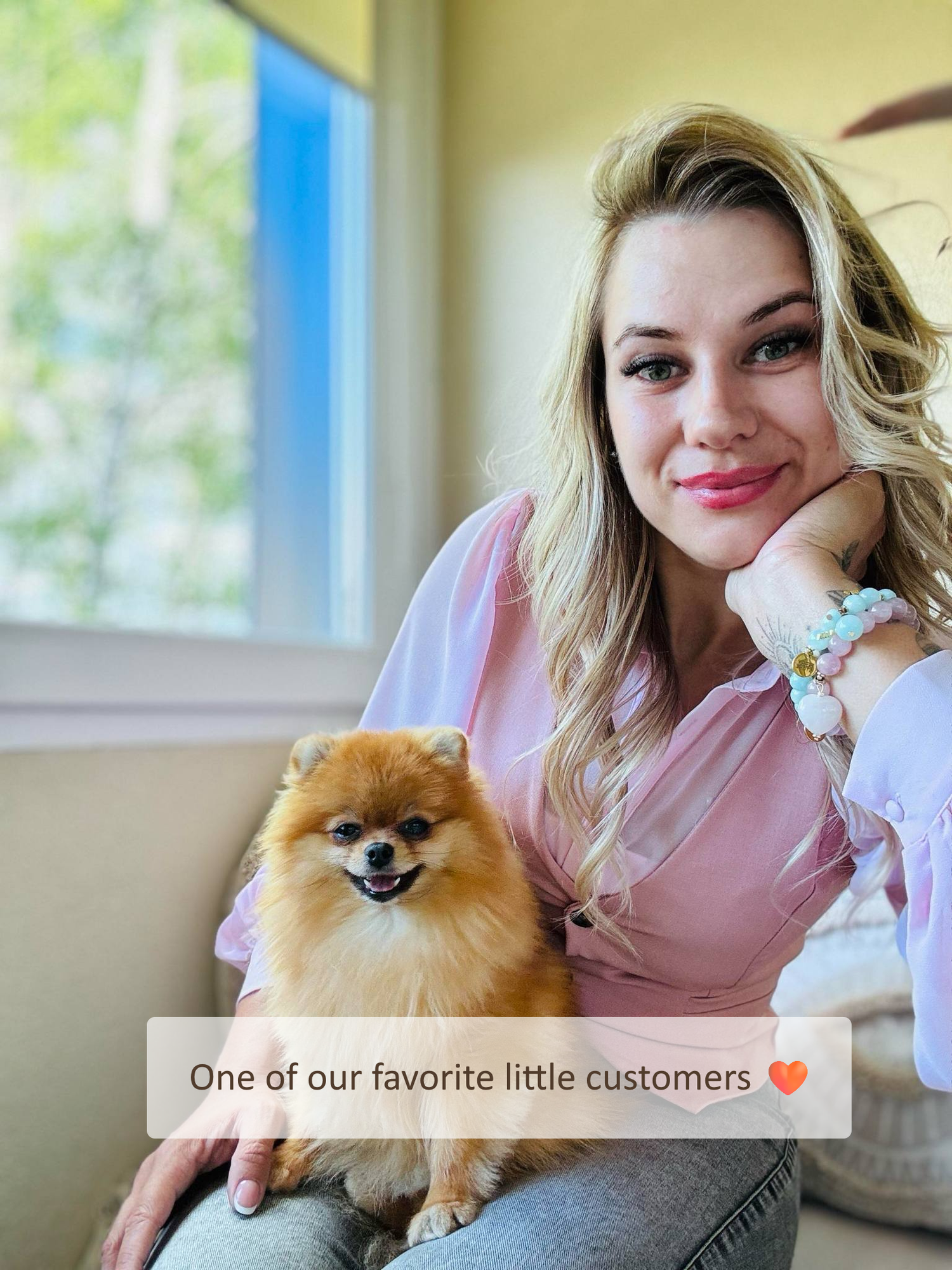 Tailwinks founder smiling with her Pomeranian dog β passion for quality pet care