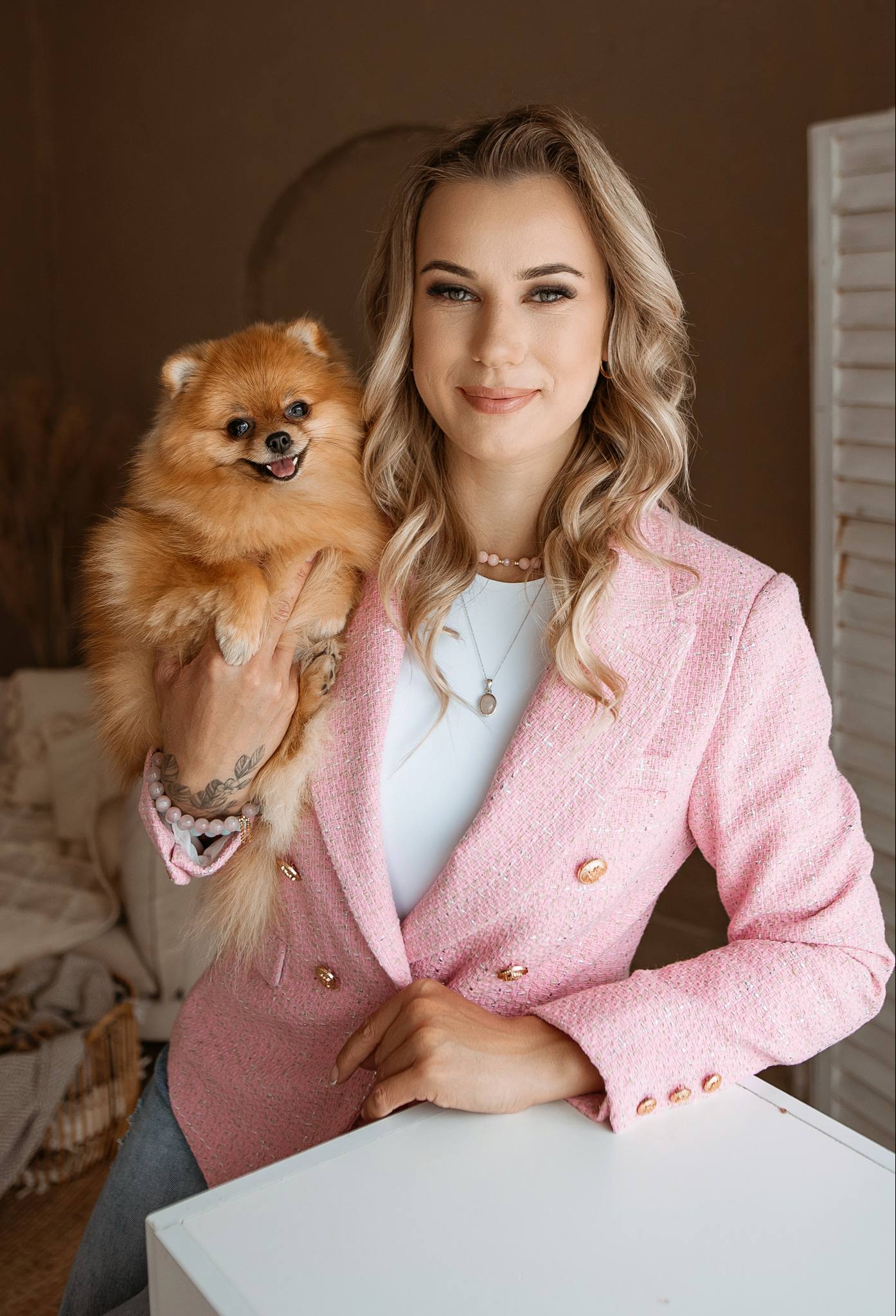 Tailwinks friend smiling with their dog 